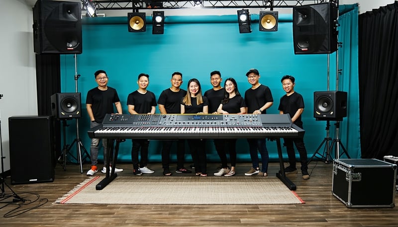 9NOTE RECORDS team collaborating in a modern Ho Chi Minh City studio 9NOTE RECORDS team collaborating in a modern Ho Chi Minh City studio